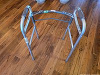 Front perspective of aluminum folding adjustable walker