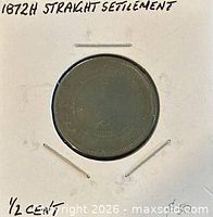 Reverse of 1872H Straits Settlements 1/2 cent coin in holder