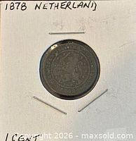 Obverse view showing crowned lion emblem and date
