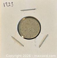 Coin obverse in 2x2 holder, date 1923 visible