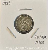 Reverse side showing THREE PENCE, oak sprig, date 1933