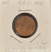 Coin in 2×2 holder showing year 1951 and farthing reverse with wren