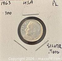 Obverse view of 1963 proof-like dime in holder annotated with year, country, silver fineness
