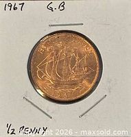 Obverse view of the 1967 GB half penny in holder