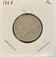 Reverse view of 1968 Canadian 25-cent coin showing caribou design