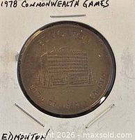 Obverse of bronze medal showing building and inscription Edmonton Capital of Alberta Canada