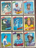 Front view all nine cards showing player images and teams