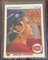 Front view of Guy Carbonneau Upper Deck card in sleeve