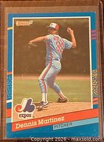 Front of 1991 Donruss Dennis Martinez #139 card showing player in pitching motion