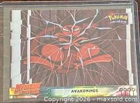 Front of 1999 Topps Pokémon Awakenings card in sleeve