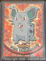 Front of Nidoran♀ card in plastic holder
