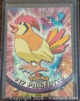 Front of Pidgeotto #17 holographic Topps Pokémon card in plastic holder