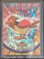 Front view of Spearow #21 foil trading card in holder
