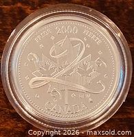 Reverse design with numeral 2 and maple leaf