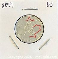 Coin in 2x2 flip, year and BU noted