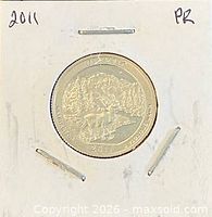 Obverse view of quarter in holder showing date 2011 and PR notation