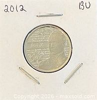 Coin in flip showing reverse Sir Isaac Brock design