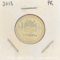 Coin in 2x2 flip, year and PR noted