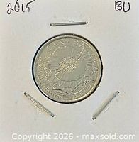 Full view of coin in 2x2 cardboard flip