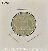 Reverse of 2015 25-cent commemorative coin inside 2×2 flip