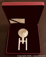 Coin in display case