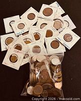 Overall lot including both flipped and loose coins