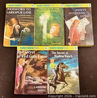 Front cover view of all five Nancy Drew hardcovers