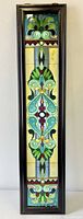 Full view of framed stained glass panel