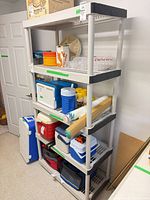 Full view of assembled 5-shelf unit with contents (contents not included)