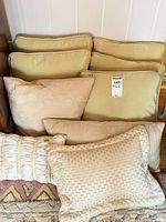 Group shot showing eight pillows in lot