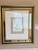 Full view of framed print showing bottle image, mat and frame