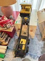 Top view of Tonka dump truck showing yellow bed and black cab