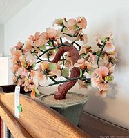 Full view of artificial bonsai tree on shelf