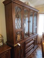 Front and side view of full Bassett china cabinet