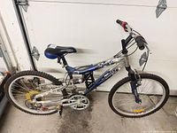 Right side view of entire bike showing frame, wheels, drivetrain and suspension