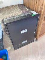 front view of black two-drawer metal file cabinet