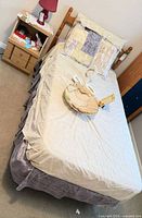 Full view of assembled twin bed with mattress and bedding removed for clarity