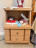 Front view showing entire nightstand, open shelf, two drawers