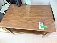 Top view showing walnut veneer surface and size tag