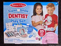 Front of box showing Melissa & Doug Super Smile Dentist Play Set