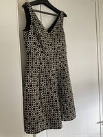 Full view of front of dress hanging