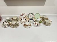 Full grouping of all teacups and saucers
