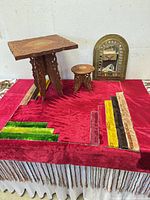 Group showing both tables, mirror and velvet frieze