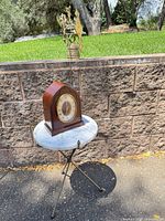 Clock, bell and table full view
