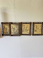 Four framed prints side by side