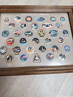 Wood-framed Space Shuttle Missions patch display