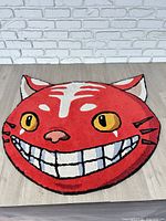 Full view of rug on floor showing design and overall size