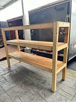 Front angle view showing full three-tier shelf and overall structure