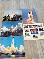 All five posters laid out displaying images and sizes