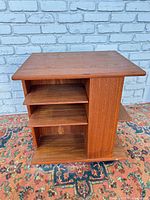 front view showing top and shelves